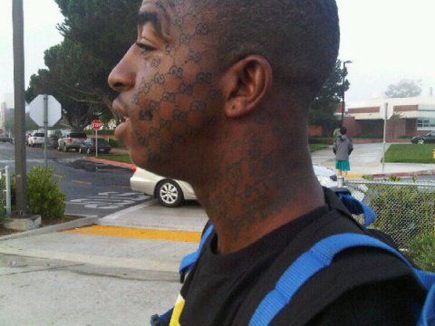 gucci new tattoo on face. #39;Gucci Face#39; Boy?